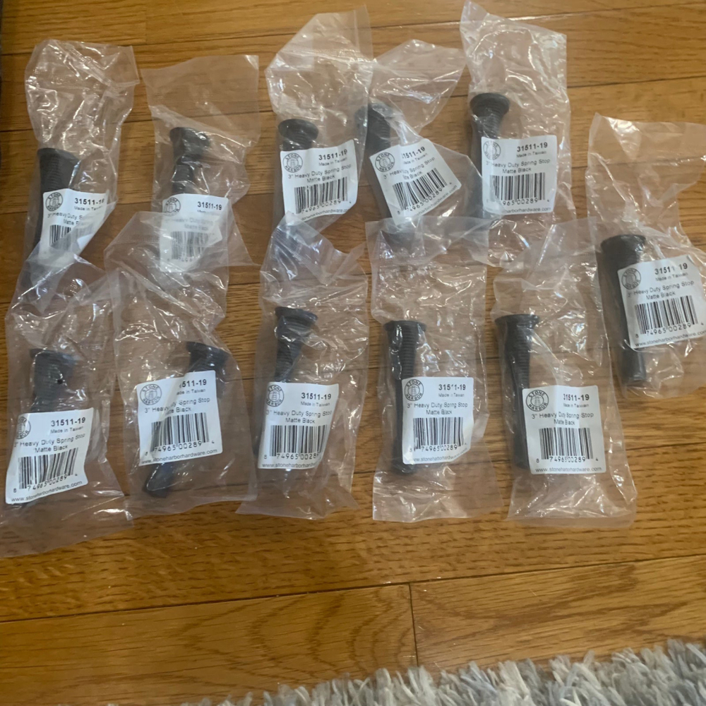 11 pack of Heavy Duty Stone Harbor Spring Door Stoppers Matte Black